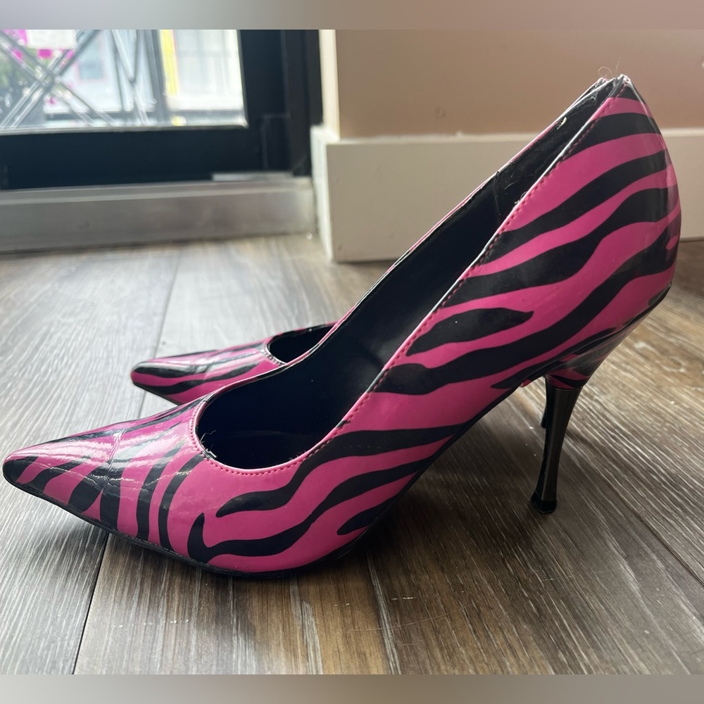 Pink and black zebra print pumps